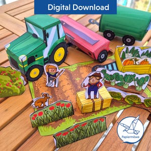 May include: A paper craft farm set featuring a green tractor, a pink trailer, a yellow wagon with pumpkins, a hay bale, and various cutouts of people, a rabbit, and garden rows with red poppies and green vegetables, labelled Digital Download.
