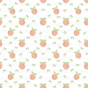 May include: A repeating pattern featuring peaches and green bows on a white backdrop. The peaches are a soft orange hue with green leaves. The bows are a light green colour. The pattern is evenly spaced.