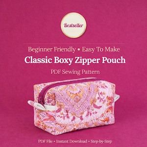 May include: A pink and orange floral patterned boxy zipper pouch with a magenta zipper. The text "Classic Boxy Zipper Pouch" is displayed above the pouch. The image also includes the text "Beginner Friendly" and "Easy To Make".
