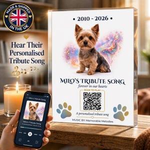 May include: A memorial tribute display with a Yorkshire Terrier image, the text "Milo's Tribute Song", and a QR code. The display includes the years 2010-2026 and paw prints. The phrase "Made & Shipped in the UK" is also visible.