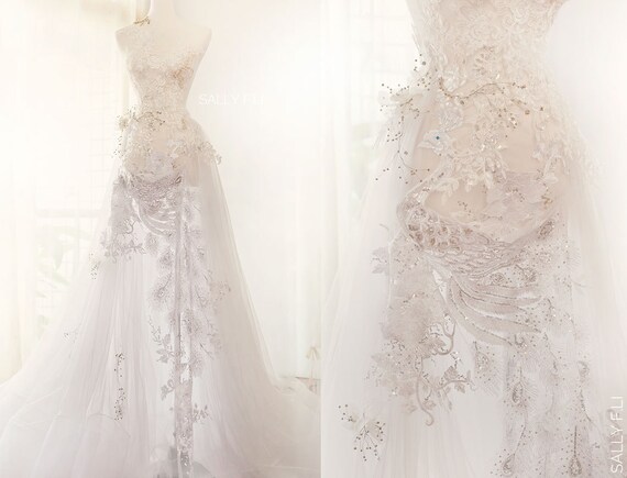 white peacock wedding dress