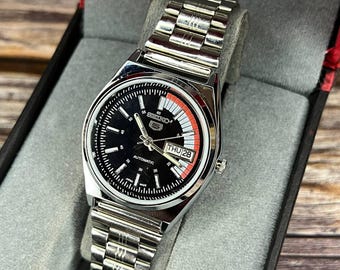 montre-bracelet automatique seiko 5 vintage reconditionnée cadran noir bracelet en acier inoxydable