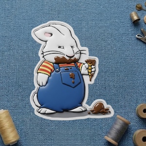 May include: A white cartoon rabbit with chocolate on its face and blue overalls, holding a chocolate ice cream cone. The rabbit is standing on a blue surface. The image is a sticker or a similar product.