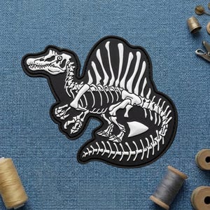 Spinosaurus Skeleton PVC Patch Hook and Loop, Dinosaur Bone Fossil Glow in Dark Rubber Morale Patch, Jurassic Paleontology Badge Backpack