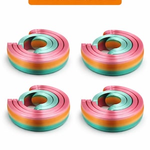 May include: Four colourful, abstract, layered objects in a bundle. Each object has a pink, orange, and teal colour scheme. The objects are arranged in a circular shape with a curved top. The text "4-PACK BUNDLE" is in an orange rectangle.