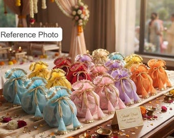May include: A collection of small, semi-sheer drawstring pouches in various pastel and vibrant colors, including light blue, yellow, red, pink, purple, and orange. Each pouch features a gold drawstring closure with tassels and decorative trim.
