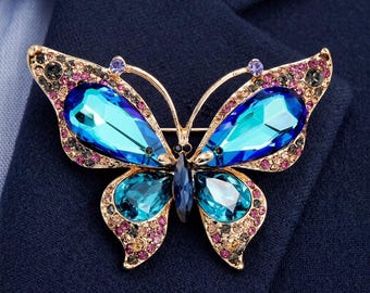 Broche de mariposa hecho a mano con diamantes de imitación morados y azules, broche brillante de cristal para abrigo, bufanda, accesorio para ramo de novia.