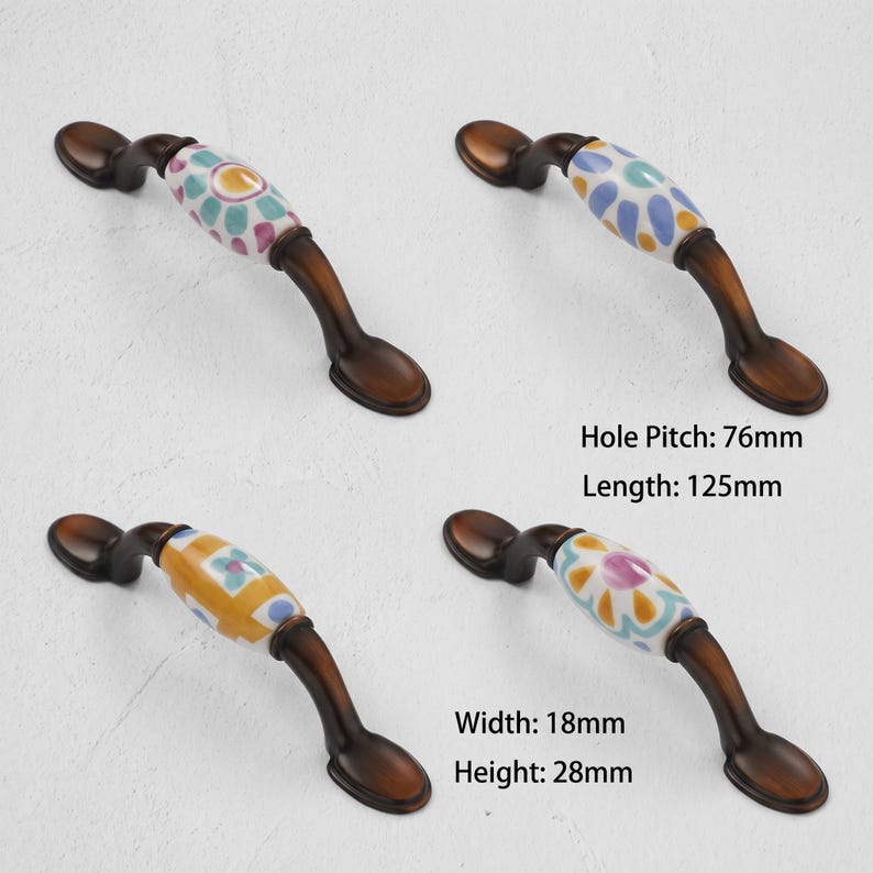 May include: Four arched cabinet handles with dark bronze metal ends and central ceramic sections featuring colorful floral patterns. The handles have a hole pitch of 76mm, a length of 125mm, a width of 18mm, and a height of 28mm as indicated by text.