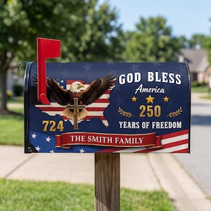 May include: A mailbox with a patriotic design featuring an American flag, an eagle, and the text "God Bless America." The mailbox also displays the number "724" and "250 Years of Freedom."