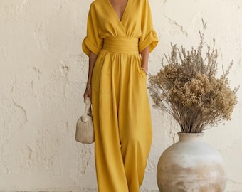Boho-chique jumpsuit voor dames met wijde pijpen, diepe V-hals en vleermuismouwen; moeiteloze zomerse elegantie voor werk, strand, vakantie en casual gelegenheden.