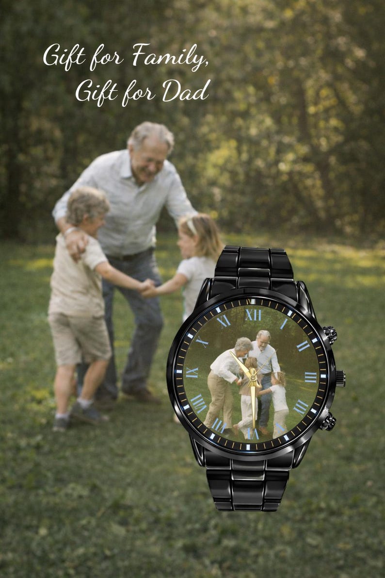 May include: Black wristwatch with a photo of a family. The watch has a black metal band and a round face with Roman numerals. The background shows a family playing in a park. Text on the image reads "Gift for Family, Gift for Dad."