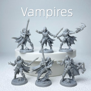 May include: Six gray miniature vampire figurines in various action poses, each holding a sword or a bat-like object. The word "Vampires" is written in white across the top of the image. These detailed figures are likely for tabletop gaming or collecting.