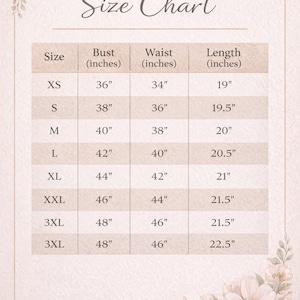 May include: A size chart with the title "Size Chart" in a decorative font. The chart lists sizes XS to 3XL, with bust, waist, and length measurements in inches. Floral accents frame the chart.