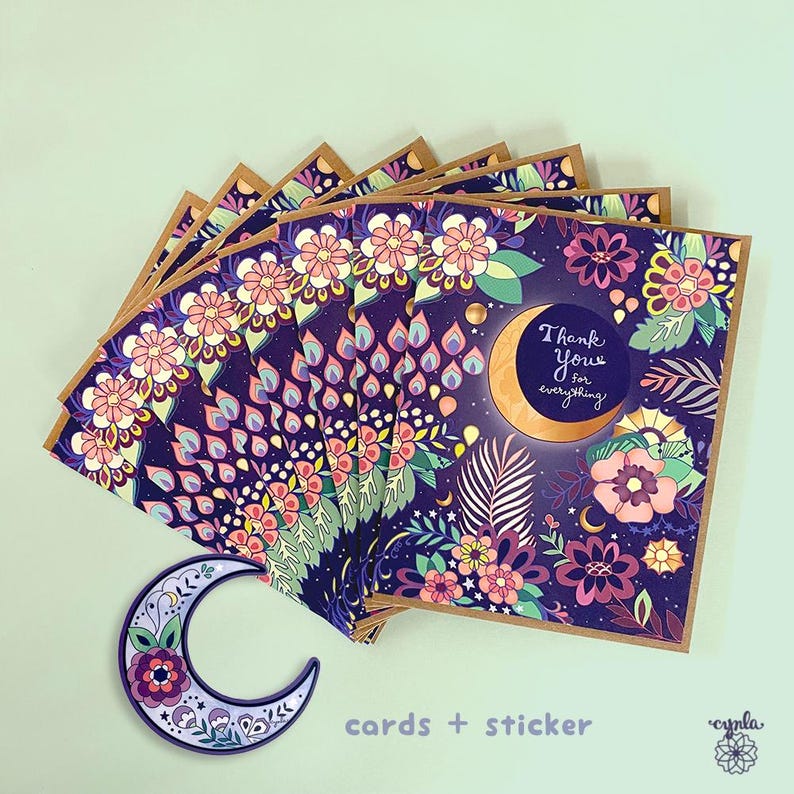 May include: A stack of greeting cards with a floral and crescent moon design. The cards have a dark purple background with pink, white, and green flowers. The text "Thank you for everything" is on the cards. A crescent moon sticker is also included.