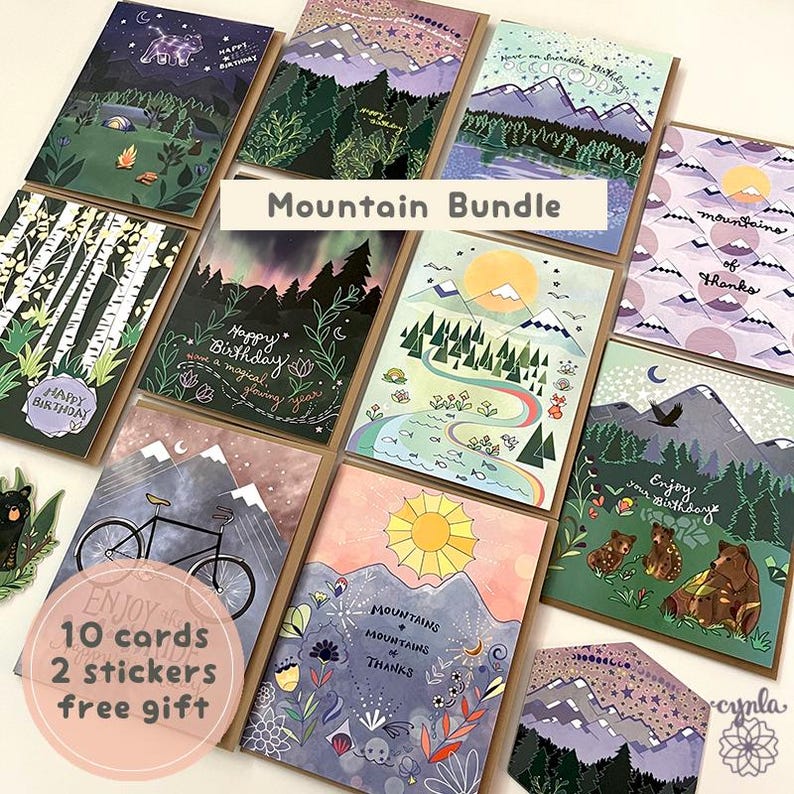 May include: A collection of illustrated greeting cards with mountain themes. The cards feature various designs, including mountains, forests, and animals. The text "Mountain Bundle" is displayed. The bundle includes 10 cards and 2 stickers.