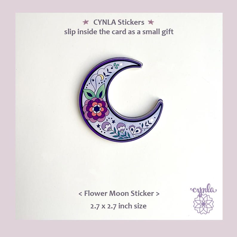 May include: A purple, floral-decorated crescent moon sticker. The sticker has a dark purple border and features a central flower design with pink, purple, and green accents. The sticker is 2.7 x 2.7 inches and is labeled "Flower Moon Sticker."