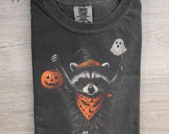 Cute Halloween Raccoon Shirt, Trick or Treat Tee, Spooky Season Graphic Tee, Witch Raccoon Shirt, Funny Halloween Gift, Fall Aesthetic Shirt