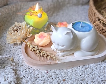 Idea de regalo para el Día de la Madre: un gato y su vela.