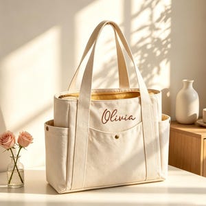 Bolso de mano de lona bordado personalizado, bolso de hombro para el trabajo con múltiples bolsillos.