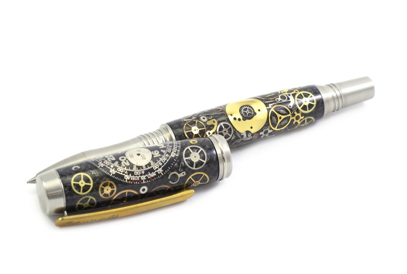 May include: A steampunk-style pen with a black and silver body, adorned with intricate gold and silver gears. The pen's design includes a clock face and a metallic tip, showcasing a blend of industrial and artistic elements.