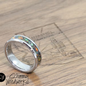 Titanium ring with opal