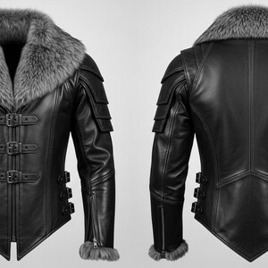 May include: Black leather jacket with a grey fur collar and cuffs. The jacket has multiple buckles, zippers, and shoulder detailing. The image shows both the front and back of the jacket.
