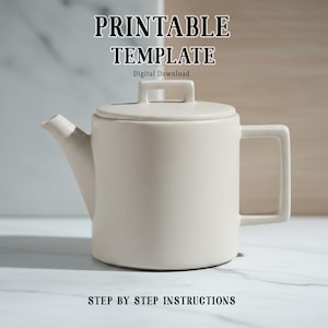 May include: A cream-colored ceramic teapot with a square handle and a lid. The teapot has a spout and is labeled "PRINTABLE TEMPLATE" and "STEP BY STEP INSTRUCTIONS". The words "Digital Download" are also visible.