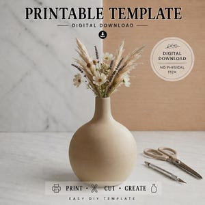 May include: A beige round vase containing dried pampas grass, lavender, and white flowers. Text reads: PRINTABLE TEMPLATE, DIGITAL DOWNLOAD, NO PHYSICAL ITEM, PRINT, CUT, CREATE, EASY DIY TEMPLATE. A pair of scissors and a craft knife are visible.