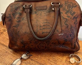 Vintage leather hold-all or weekend bag from ‘Duffer St George’