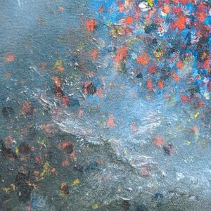 May include: An abstract painting on canvas featuring a textured surface with a gradient transition from a dark gray base to a vibrant upper section. The composition is filled with scattered dabs of red, orange, yellow, blue, and white paint.