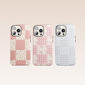 May include: Three phone cases with patchwork designs. The cases feature a mix of floral, gingham, and solid squares in shades of pink, white, and blue. The cases have a camera cutout and black side buttons.