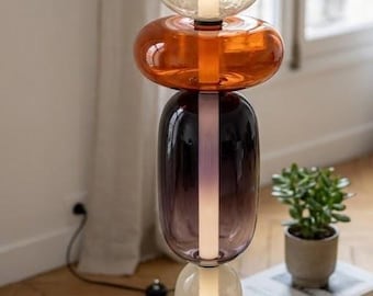 Lampada da terra scultorea in vetro, tonalità crema ambrata fumé, illuminazione d'ambiente moderna