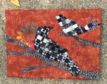 Woven fabric blackbird collage art quilt