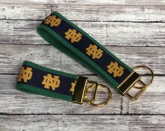 Irish Inspired keychain wristlet .  2 piece set . Blue and Gold key chain set .