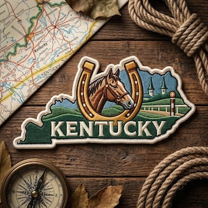 May include: Embroidered patch in the shape of Kentucky, featuring a horse head inside a horseshoe. The patch has a green border with the word "Kentucky" in white. A map, compass, and rope are in the background.