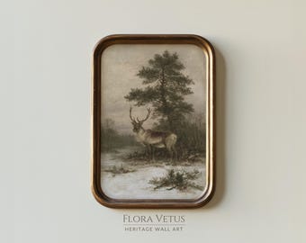 May include: A rectangular wall art piece in a dark brown frame featuring a monochromatic landscape painting of a deer standing in a snowy field near a tall tree. Below the frame, the text reads FLORA VETUS HERITAGE WALL ART in dark grey.