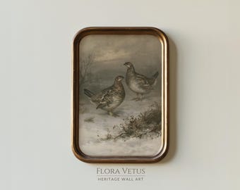 May include: A rectangular wall art print in a dark brown frame featuring a muted painting of two birds standing in a snowy landscape with sparse vegetation. Below the frame, the text FLORA VETUS HERITAGE WALL ART is printed in a dark grey font.