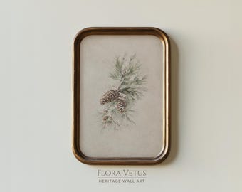 May include: A rectangular wall art piece in a metallic bronze frame featuring a botanical illustration of pine needles and two brown pinecones on a light beige background. The text FLORA VETUS HERITAGE WALL ART is printed below the frame.