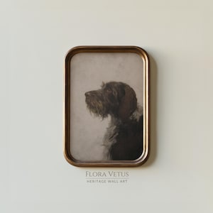 May include: A framed vintage-style print featuring a detailed portrait of a dog in profile. The dog has dark brown fur and a long, shaggy beard. The frame is a warm gold color. The text "FLORA VETUS HERITAGE WALL ART" is at the bottom.