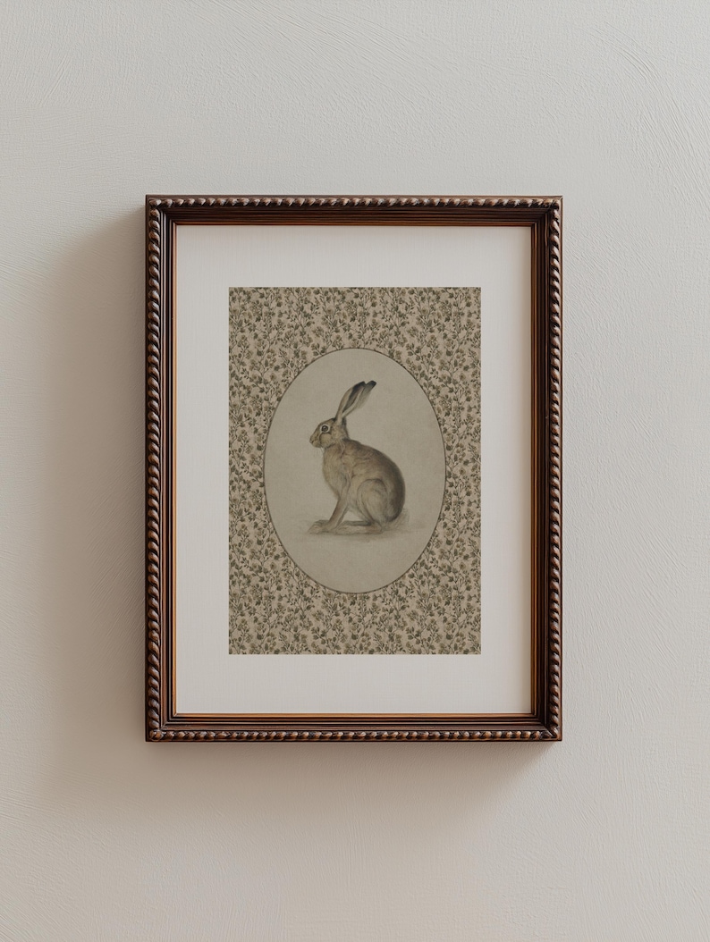 Hare print in a classic frame on a pale wall, presented with calm spacing and heritage styling.