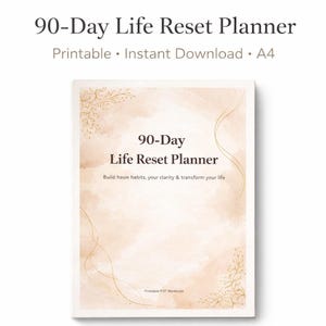 Op de afbeelding: Een 90-daagse Life Reset Planner met een zachte, aquarel-stijl cover. De cover toont de titel "90-Day Life Reset Planner" in een vetgedrukte letter, met de tekst "Printable • Instant Download • A4" erboven. Het ontwerp bevat bloemaccenten.