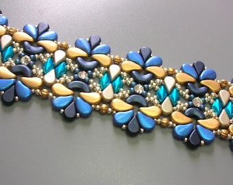 May include: A beaded bracelet with a repeating pattern of gold, blue, and turquoise beads. The bracelet is made with small, round beads and larger, teardrop-shaped beads.