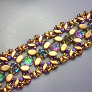 May include: A gold and purple beaded bracelet with a geometric pattern. The bracelet features iridescent glass beads and gold leaf-shaped beads.
