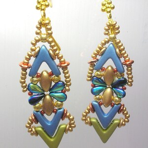 May include: A pair of gold, blue, green, and copper beaded earrings with a geometric design. The earrings are long and dangle.
