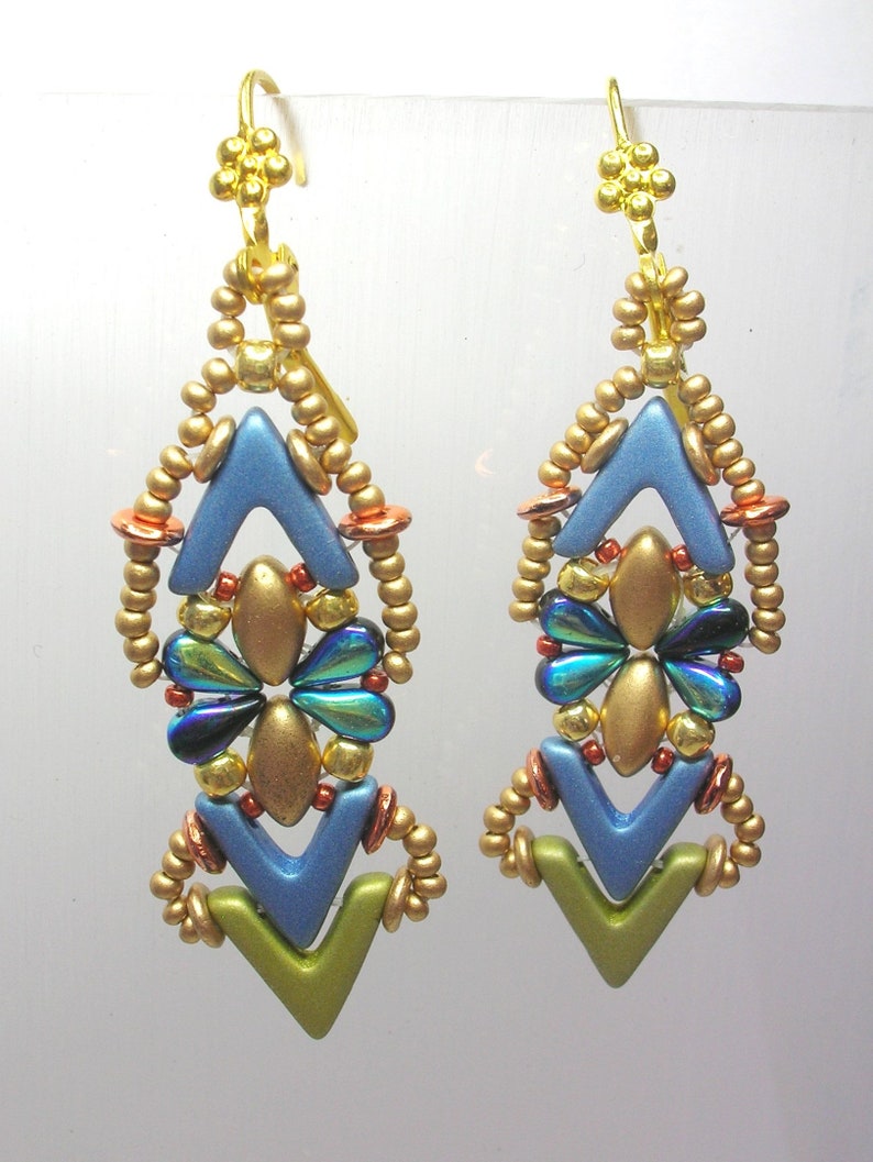 May include: A pair of gold, blue, green, and copper beaded earrings with a geometric design. The earrings are long and dangle.