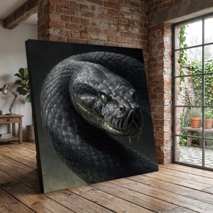 May include: A canvas print depicting a detailed illustration of a coiled black snake. The snake has textured scales, green eyes, and a slightly open mouth. The artwork is set against a dark background, creating a dramatic effect.