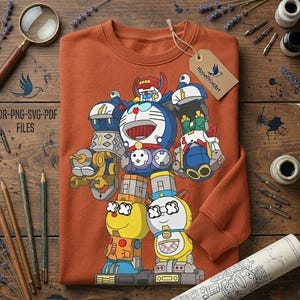 May include: Rust-colored sweatshirt featuring a colorful cartoon robot design. The robot is primarily blue, white, yellow, and red, with a large smiling face. The tag reads "HopePrintArt". The text "CDR-PNG-SVG-PDF FILES" is visible.