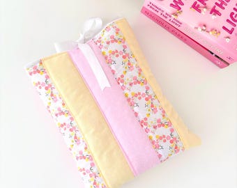 Pastel pink and yellow patchwork quilted book sleeve