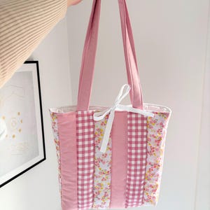 Pink patchwork quilted tote bag