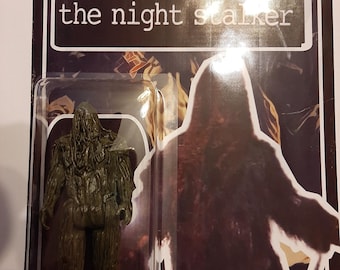 May include: A vintage-style action figure of the Spanish Moss Monster from Kolchak: The Night Stalker. The figure is green and brown, packaged in a retro-style blister pack with the show's logo and character name.